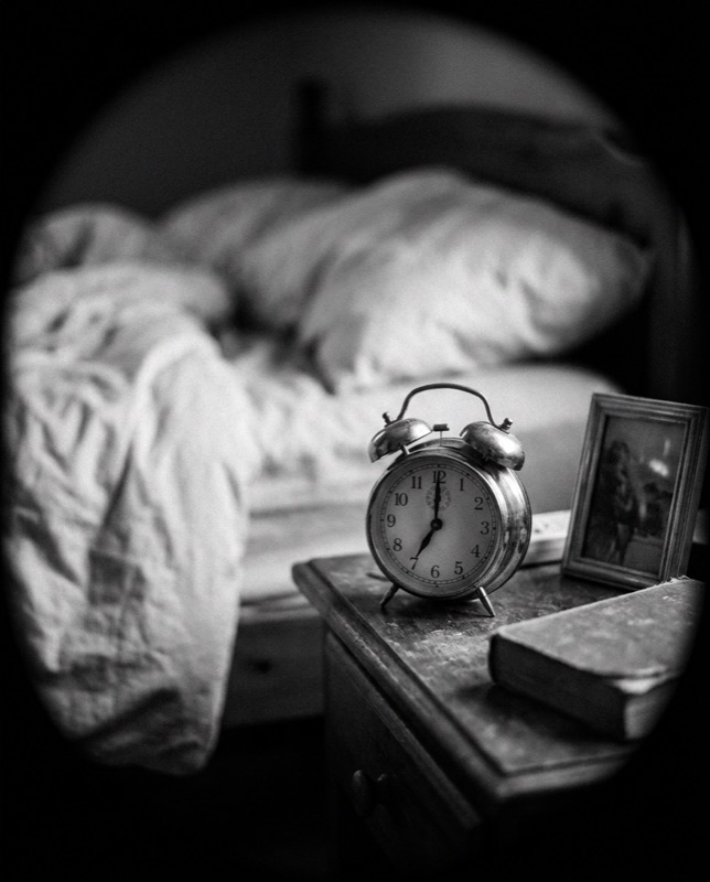 An alarm clock showing 7:00